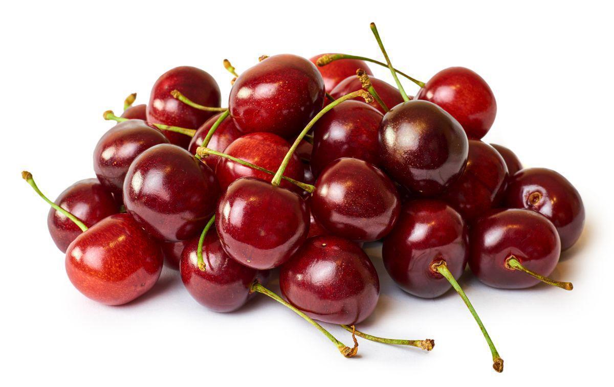 This is a picture of two cherries on a white background.