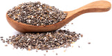 Chia Seeds in a pile on white background and also in wooden spoon