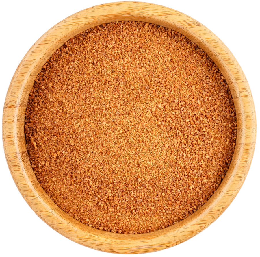 Image of brown Coconut Palm Sugar in a wooden bowl