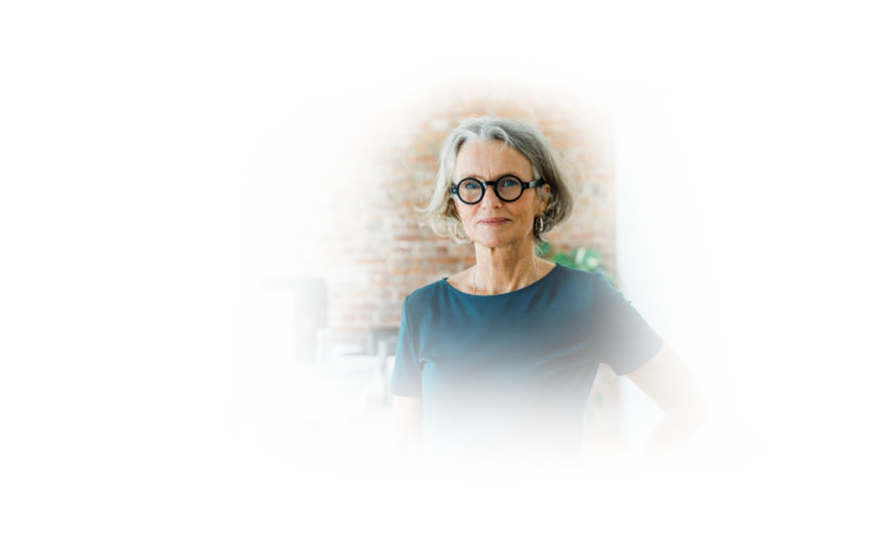 Image of older woman with grey hair.
