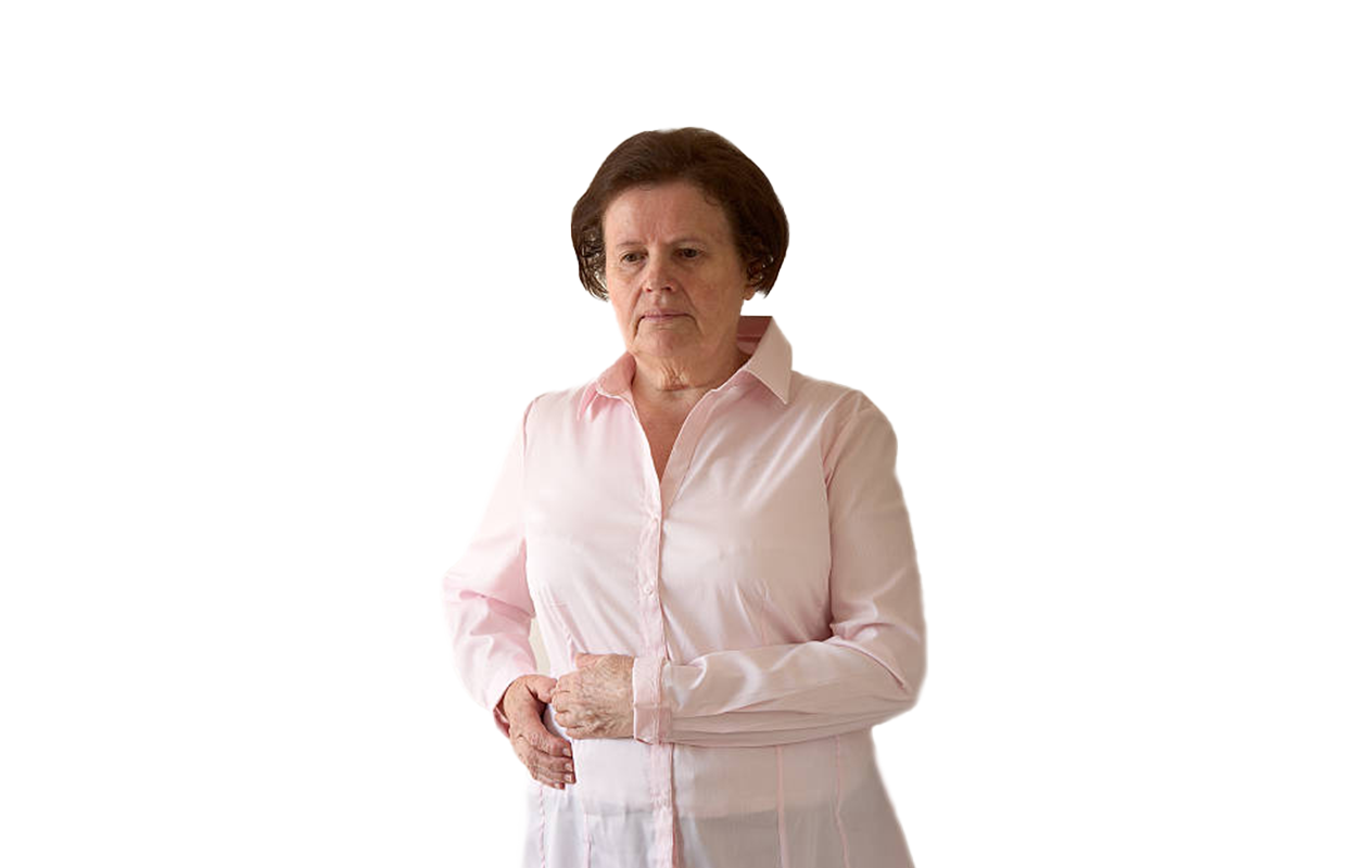Photo of older woman with hands on her liver because of hepatitis