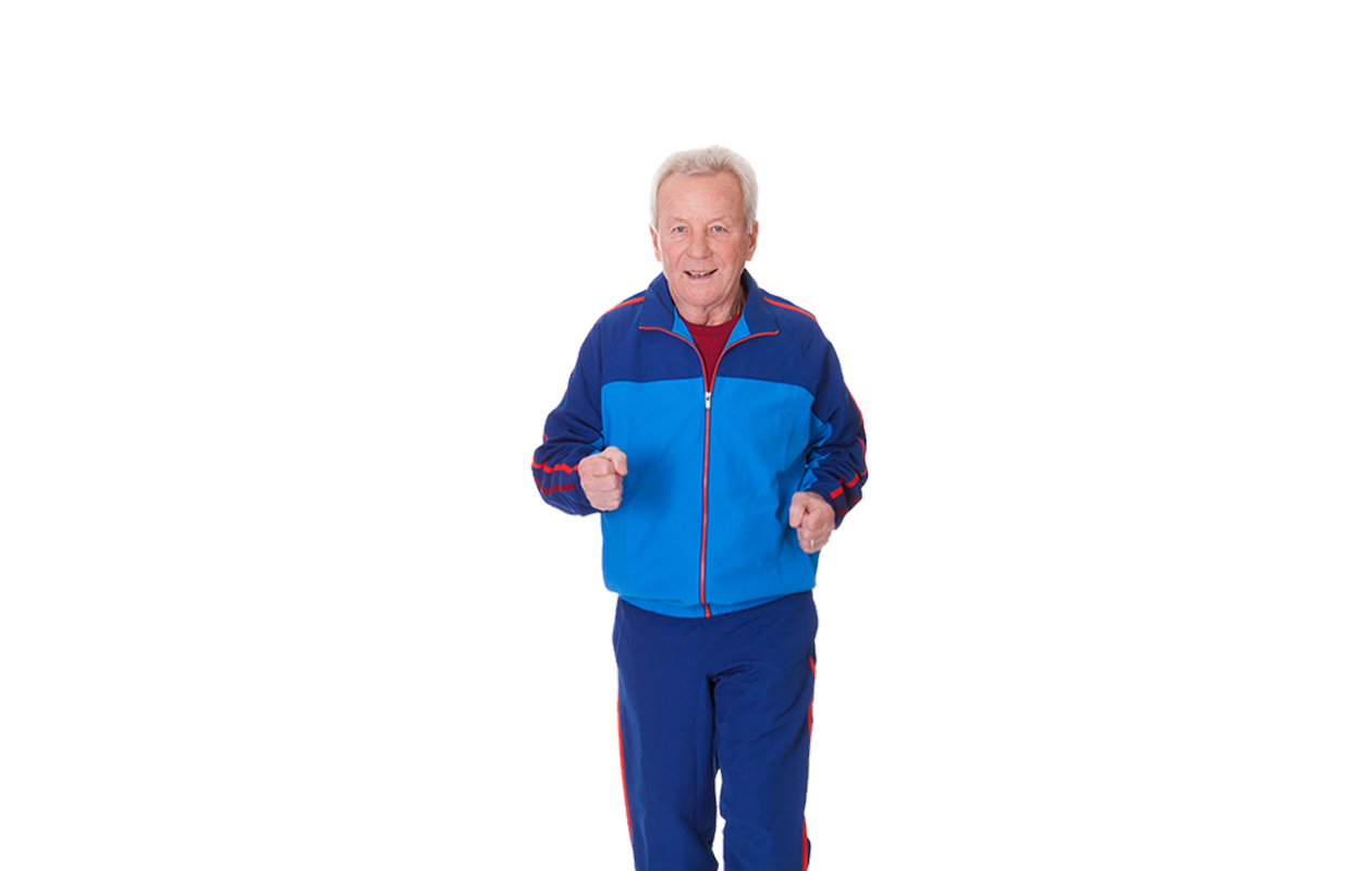 Photo of older man looking happy while jogging and wearing blue jumpsuit