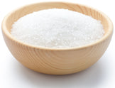 Stevia in wood bowl sitting on white background