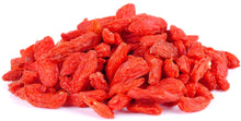 Close up image of Sun Dried Goji Berries on white background.