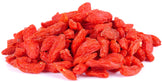 Close up image of Sun Dried Goji Berries on white background.