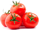Tomatoes stacked on white back ground