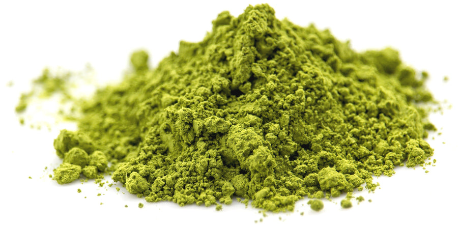 Pile of Ultimate 25 Superfood Fusion powder on white background