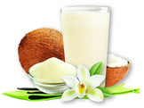 Glass of delicious looking Vanilla Cream Whey Protein Isolate next to whole coconut and cop of the powder