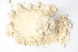 Whey Protein Isolate powder with scoop
