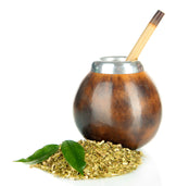 Image of Yerba Mate Tea Green shreds and a tea maker
