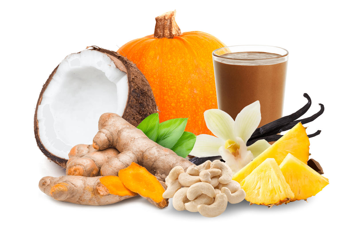 Image of sliced coconut, turmeric root, and sliced pineapple with smoothie in background.