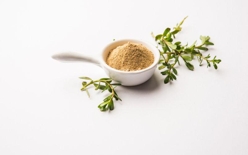 This is a picture of bacopa powder on a white background.