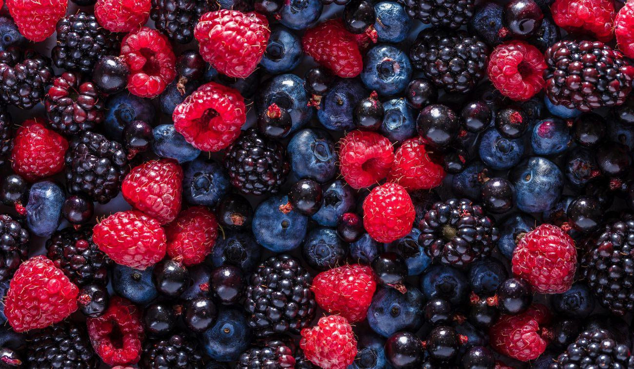 This is a picture of raspberries, blueberries and blackberries