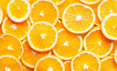 This is a picture of many orange slices laying flat