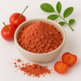 Image of Acerola cherry powder in a white bowl with fresh acerolas surrounding it