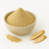 astragalus root powder mounded in beige bowl on white background
