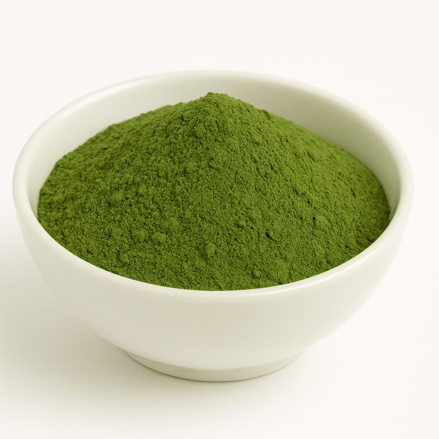 Image of a white bowl full of Barley Grass powder