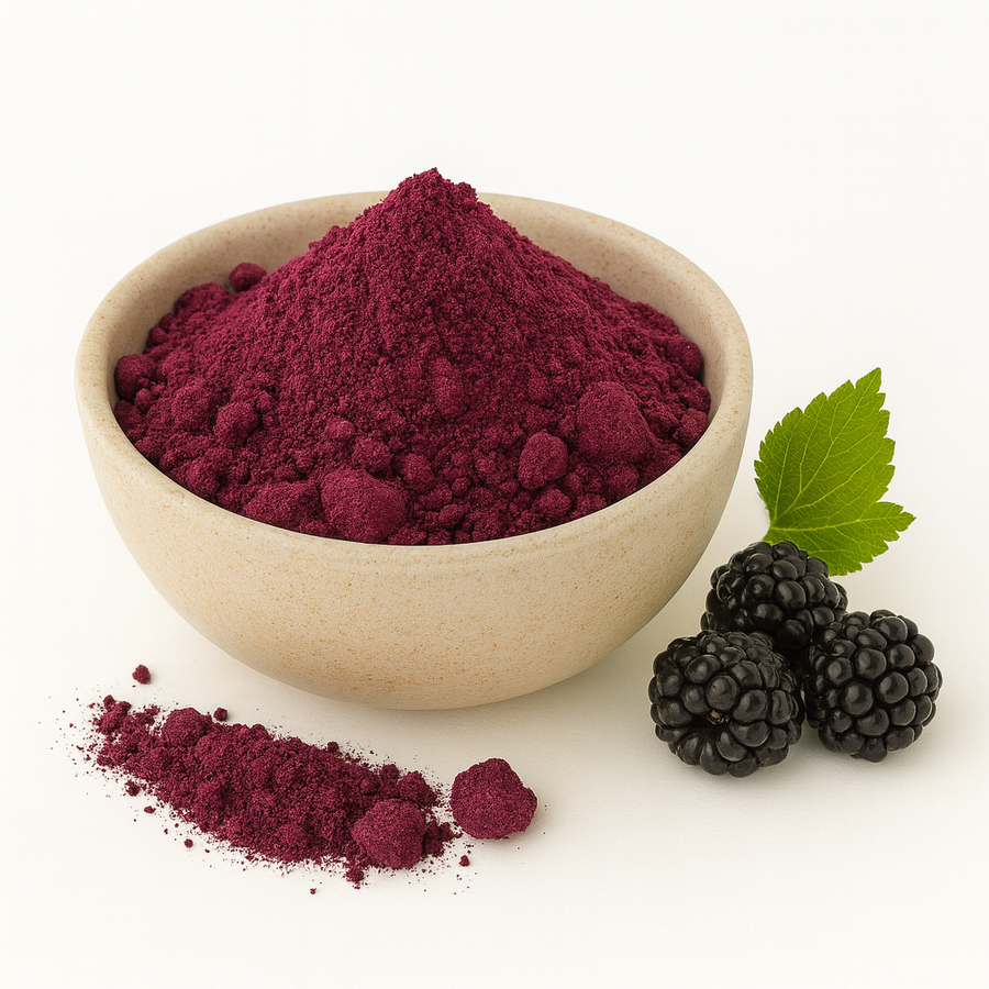 Bowl of organic freeze-dried blackberry powder on a white background.