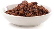 Sideview image of Cacao Nibs in a white bowl