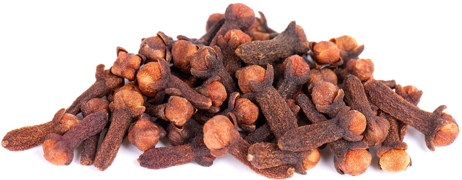 Cloves piled together on white background