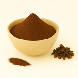 A small ceramic bowl filled with a mound of finely ground organic clove powder, rich brown in color on a white background