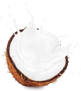 Image of halved Coconut with coconut Milk splashing out of it.