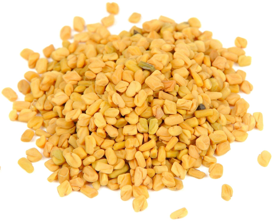 Image of multiple Fenugreek Seeds  on white background