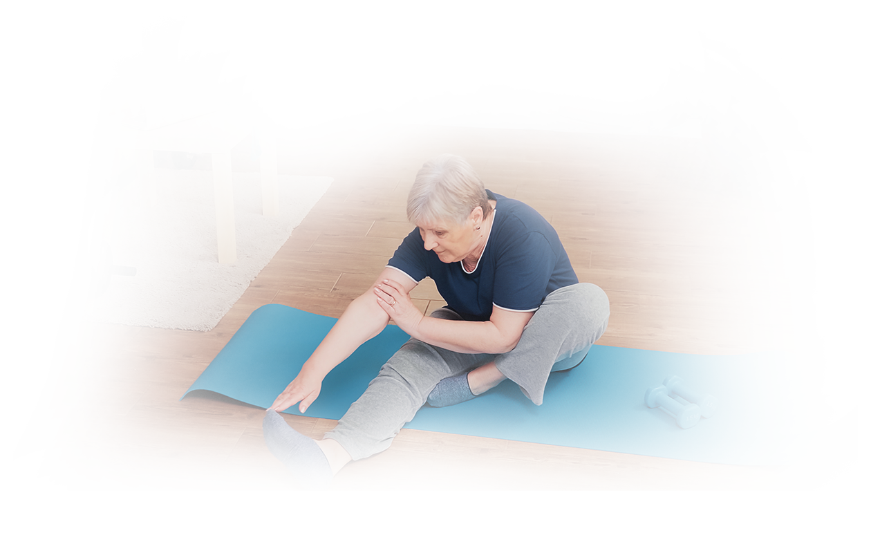 Image of woman stretching on a blue yoga mat representing good flexibility