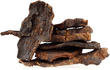 Image of dried fo-ti slices stacked on top of each other