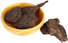 Image of Fo-ti pieces inside a wooden bowl and 1 peace outside