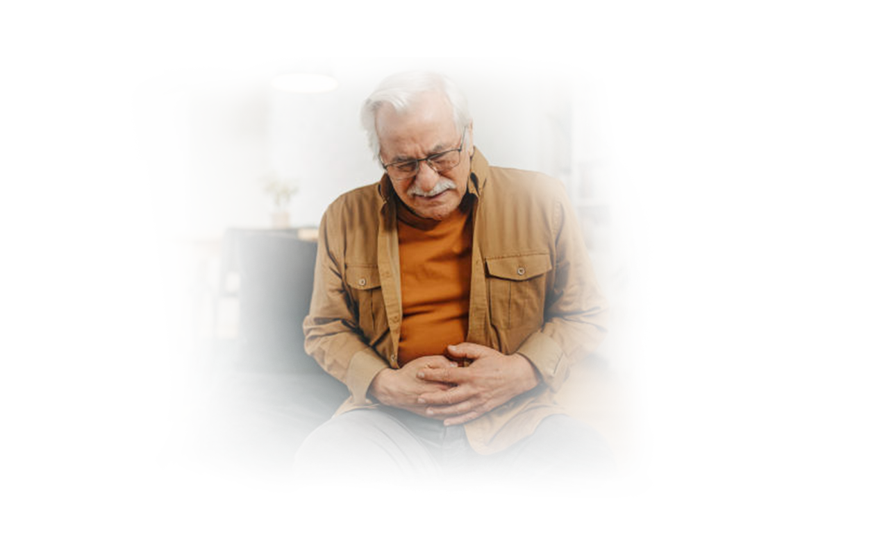 Image of older man suffering from gastrointestinal disorder.