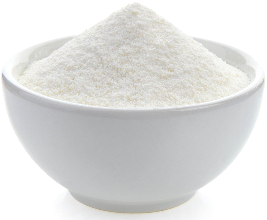 Photo of white bowl full of Goat Milk Powder 