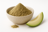 Beige ceramic bowl filled with finely milled unripe green papaya powder, softly mounded on a white background