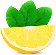 Image of lemon slice with two whole lemons in background on white background.