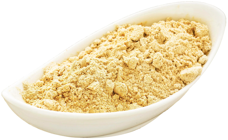 Image of Maca Root Powder in a white oval dish.