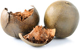 Image of a brown Luo Han Guo fruit cut in half showing its brown inside pulp