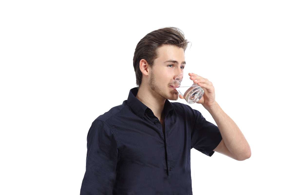 Image of young man drinking a glass of water on white background