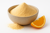 organic orange juice powder in a speckled ceramic bowl