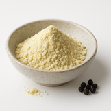 Piperine Extract Powder softly mounded in a neutral speckled ceramic bowl on a white surface