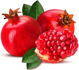 Image of a fresh Pomegranate and half of one showing its bright red seeds