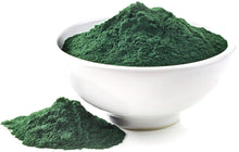 Image of Spirulina Powder - Organic on silver tablespoon on white background.