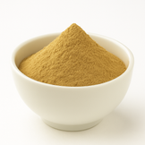 Tannish Orange color powder in a white bowl.