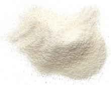 Whey Protein Concentrate powder on white background